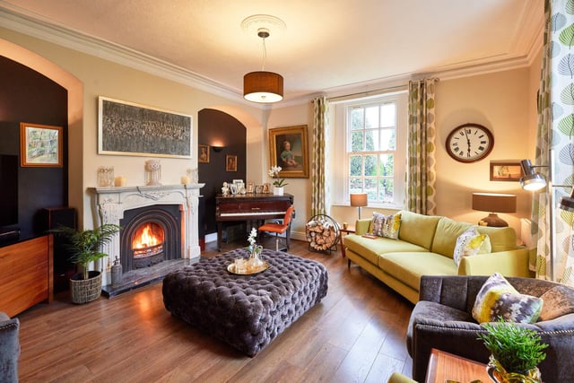 An attractive reception room, with feature fireplace.