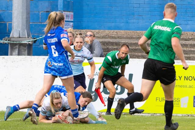 Fran Copley goes over for a try for Featherstone Rovers Ladies against Barrow. Picture: John Victor
