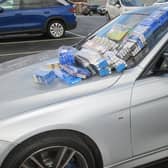Two cars  and illegal cigarettes were seized after raids on two shops in Pontefract area