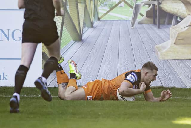 Greg Eden dives over for one of his 101 tries for Castleford Tigers. Picture: Allan McKenzie/SWpix.com