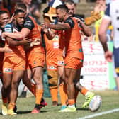 Castleford Tigers celebrate a try by Jason Qareqare in their win over Daryl Powell's Warrington Wolves. Picture by John Clifton/SWpix.com