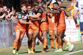 Castleford Tigers celebrate a try by Jason Qareqare in their win over Daryl Powell's Warrington Wolves. Picture by John Clifton/SWpix.com