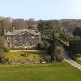 The imposing property stands in lovely landscaped grounds that include a listed 'ha-ha'.