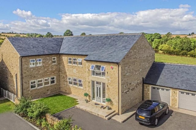 This 5 bed detached house on Haigh Lane, Flockton, briefly comprises five bathrooms and three reception rooms, open plan kitchen, snug/playroom and games room. It's for sale for £1,500,000.