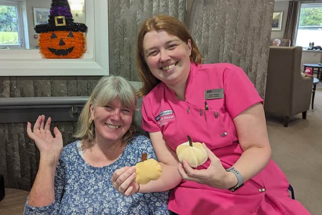 Catherine Harley and Helen Brady, pictured here with their completed Halloween pumpkins that they sew