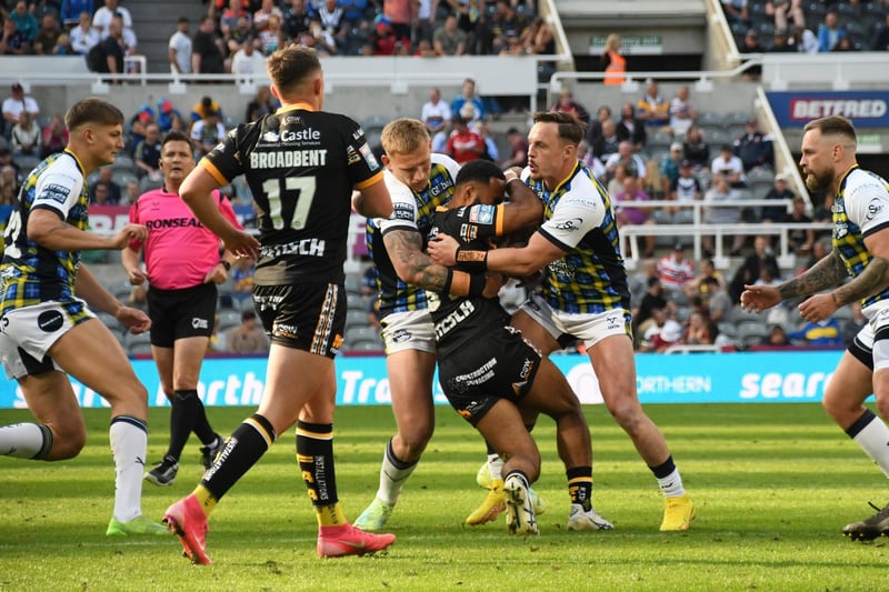 Jason Qarequare has nowhere to go this time with strong Leeds Rhinos tackling.