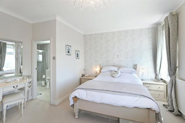 This incredible bedroom includes two double glazed windows and a contemporary en suite.