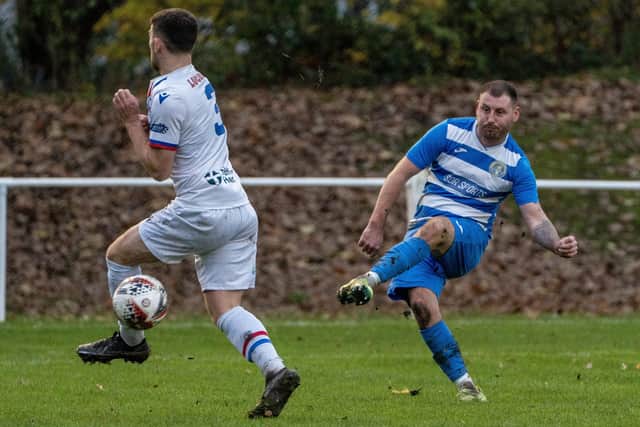 A Wakefield AFC defender tries to block Nathan Perks' shot for Glasshoughton Welfare. Picture: Scott Merrylees