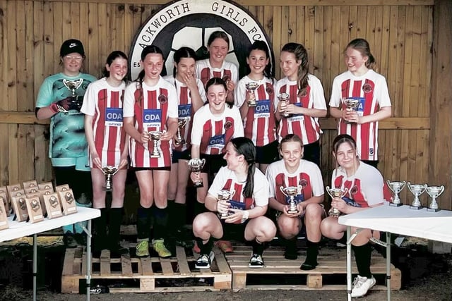 The Pontefract Wildcats Girls Football Club U13s Reds are cup champions.