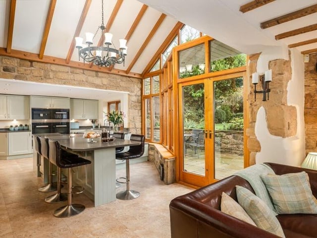 Inside Pooh Cottage, with its bespoke kitchen and indoor to outdoor living.