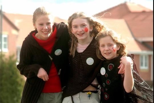 11-year-olds Hannah Zelei, Holly Abrams and Emma Hitchins walk for Red Nose Day.