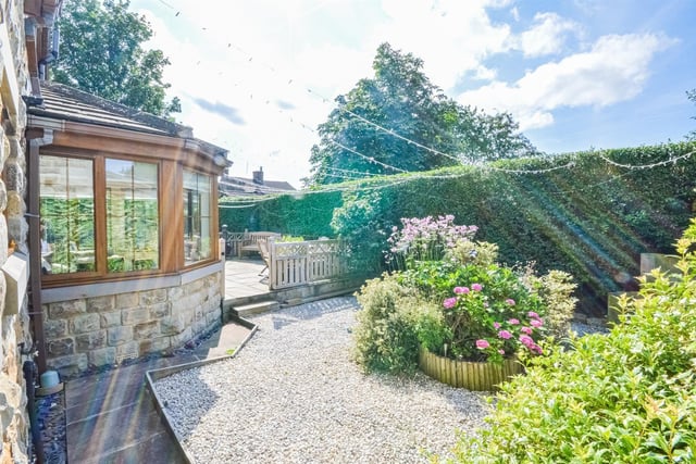 Enjoy the outdoors within established gardens that have areas of patio seating and a summer house.