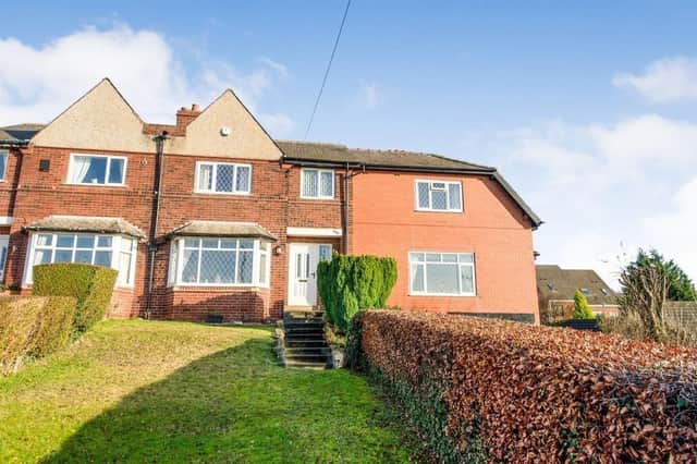 A front view of the extended semi-detached home for sale in Castleford.