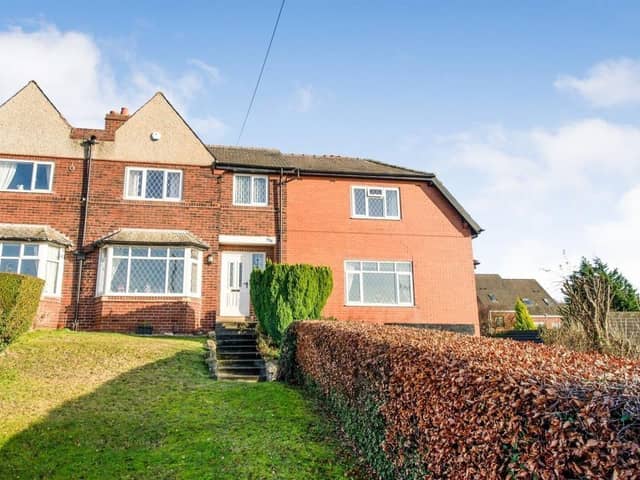 A front view of the extended semi-detached home for sale in Castleford.