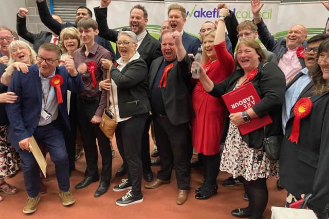 Labour councillors and supporters celebrate their success at the Wakefield Council elections