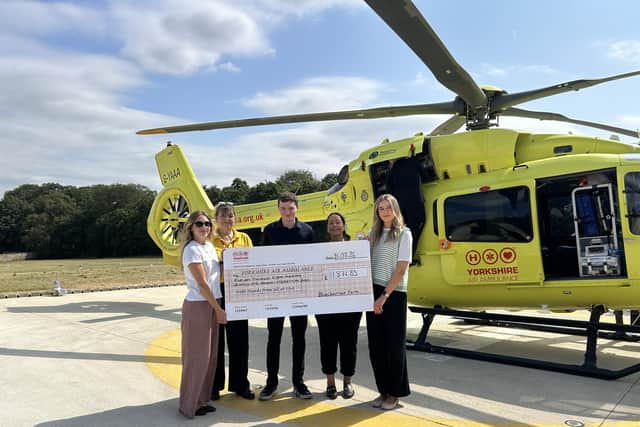 Representatives from Yorkshire Air Ambulance and Blacker Hall Farm.
