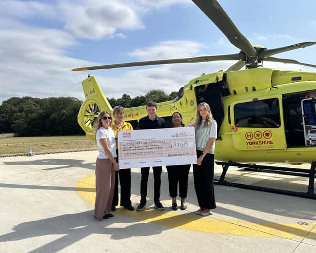 Representatives from Yorkshire Air Ambulance and Blacker Hall Farm.