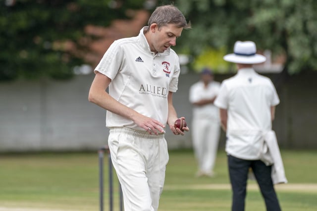 Chris Reece examines the ball before bowling for West Bretton.