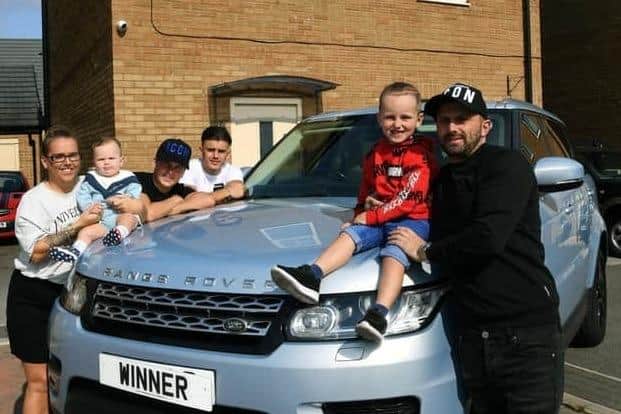 The winnings also include the family’s seven-seater Range Rover Sport and Kawasaki Ninja Superbike. Picture: Jonathan Gawthorpe