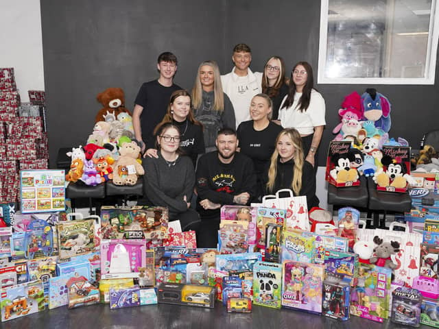 James Wilson and staff at Ink Kingz in Pontefract who did a 'tattoo for toys' event at the weekend. Picture Scott Merrylees