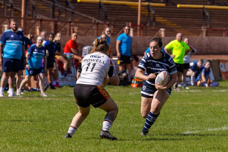 Featherstone Rovers Women's coach Marie Coley watches her player make yards.