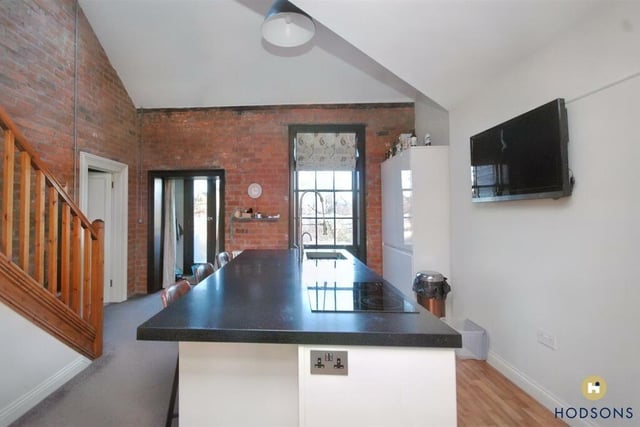 The property comes with beautiful unique features such as oak balconies, exposed brickwork and wooden floors.