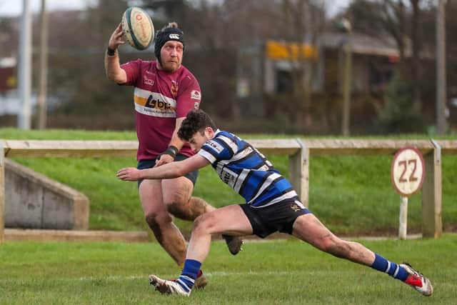 Sandal's Alex Edler looks for an offload. Picture: Simon Hall