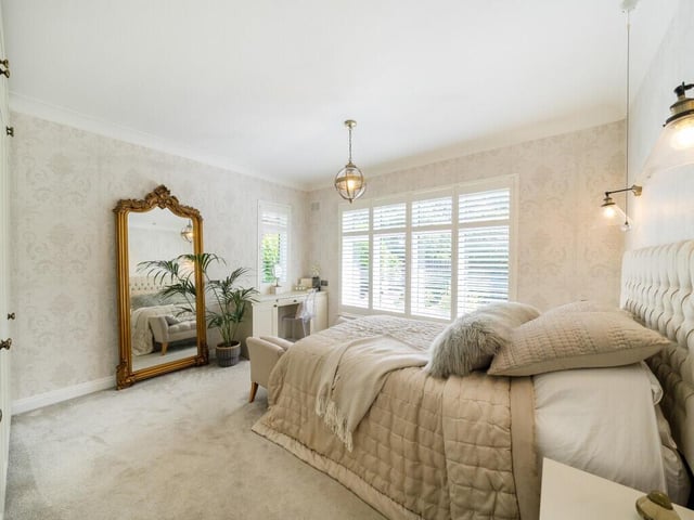 There are two generous double bedrooms also on the ground floor, as well as a downstairs bathroom and an office.