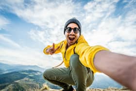Personally, if I were inclined to make it to the top of anything resembling a mountain, I would be looking for somewhere to sit down rather than worrying about capturing my best side in a selfie.