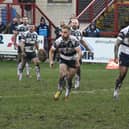 Connor Jones gets a pass away in Featherstone Rovers' narrow defeat at Batley Bulldogs. Picture: Rob Hare