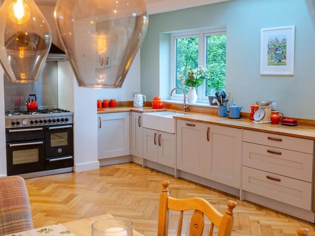 The well equipped kitchen has plenty of natural light.