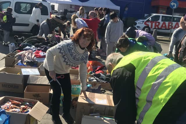 Mr and Mrs Glover handed out thousands of items including clothes, food and medical items during their previous trips to the Ukrainian border.
