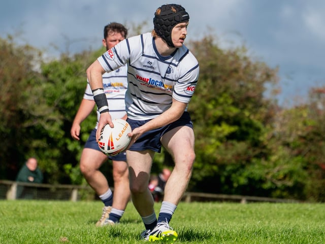 Rylan Brown sets up a first half attack for Featherstone Lions.