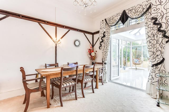 The ground floor dining room that opens through to the conservatory