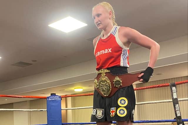 Farrah Cunniff with the Yorkshire Youth 60kg Challenge Belt belt she won against Ania Kot.