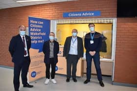 Photo left-right: Phillip Marshall, Director of Workforce and Organisational Development, Simon Topham, Chief Executive of Citizens Advice Wakefield, Len Richards, Chief Executive of The Mid Yorkshire Hospitals NHS Trust, and Pete Hudson, Outreach and Training Manager
