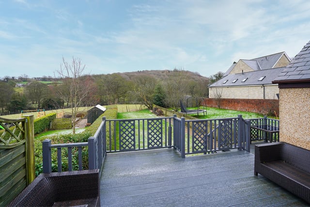 Picture yourself sitting on this terrace on a sunny day and soaking up that beautiful view of the countryside beyond the garden perimeter.