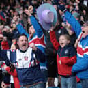 Jubilant Wakefield Trinity fans cheer their team on in the 2026 season. Picture: John Clifton Photography