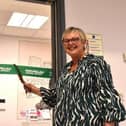 Tracey Strutt cutting the ribbon at the entrance to the new Macmillan Support Centre at Pontefract.