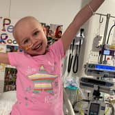 Pictured Penny Barraclough. An adorable young girl with a rare genetic condition has gone viral on social media after recording cute dance routines with her nurses. See SWNS story SWLNdance. Penny Barraclough’s incredible moves and bubbly personality led millions to watch her Tik Tok clips - as she underwent a stem cell bone marrow transplant in hospital. The six-year-old was diagnosed with congenital amegakaryocytic thrombocytopenia (CAMT),  which left her “head to toe” in bruises and stopped her blood from clotting. And after she suffered bone marrow failure, doctors first gave her chemotherapy before she had the transplant operation at Sheffield Children's hospital in September. But fearless Penny didn’t let the dangerous illness ruin her fun during her six weeks on the ward, and instead recorded videos that won her admirers from as far as Australia. And one of her clips, where she performed a catchy routine with a staff nurse, even racked up nearly eight million views on the social media app alone. Penny’s mum Jodie Mangham, 30, who helped her record the videos, said the cheeky little girl had turned a “heart-breaking” situation into a "positive" one. 