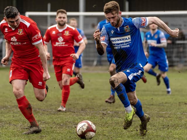 Pontefract Collieries forward Mike Dunn on the run as he attacks the Bridlington Town defence. Picture: Scott Merrylees