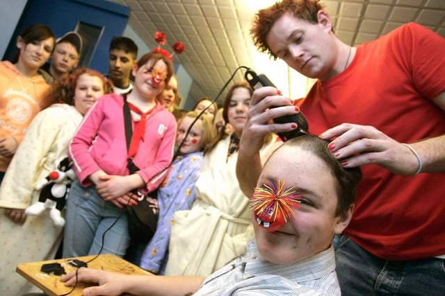 Cathedral High School pupil Matthew Leaworthy has his head shaved for Comic Relief.