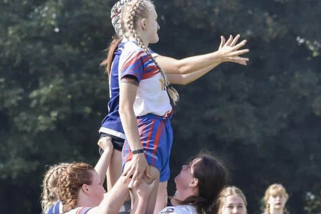 Harriett Hirst gets up high in the line-out for Castleford RUFC Girls U16s.