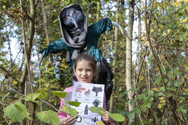 Emily Connor with a Trail Map showcasing the scarecrows, that can be purchased for £2.