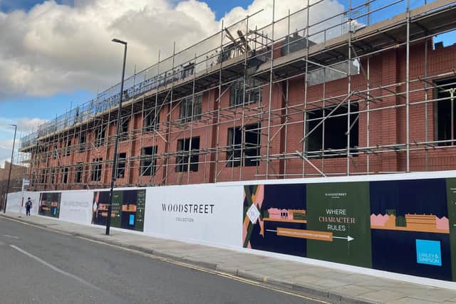 Rushbond is delivering 63 homes by converting the old Wood Street police station into apartments and building townhouses on former council-owned car parks at Rishworth Street (pictured) and Gills Yard. LDRS image