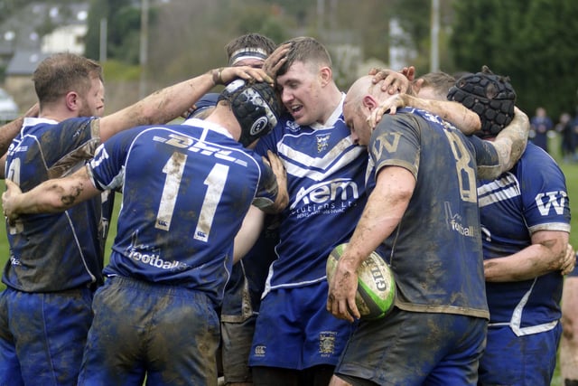 Congratulations all round as Pontefract players celebrate scoring one of their five tries against Scarborough.