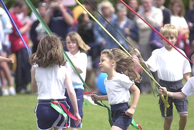 Maypole dance by Class One pupils from Darrington Church of England Junior & Infants School at the Darrington Feast in 2004.