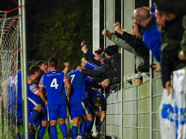 Pontefract Collieries players celebrate with supporters at the newly redeveloped "Shed End" in the game against Sheffield. Picture: JLH Photography Yorkshire