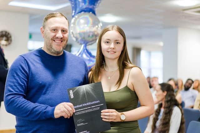 Leeds City College student Isabel McElhatton being presented with her T Level Student of the Year award by Damien Lythgoe, of NCFE.