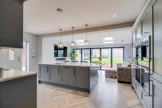 The open plan kitchen with living area.